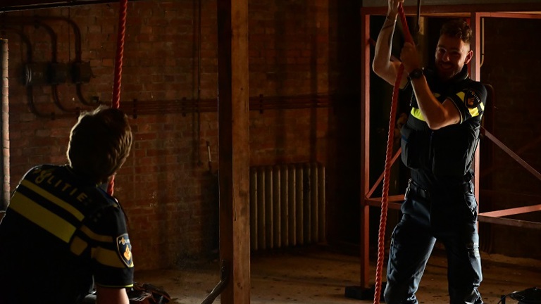 Police students ring the church bells at the Netherlands Police Academy in Apeldoorn