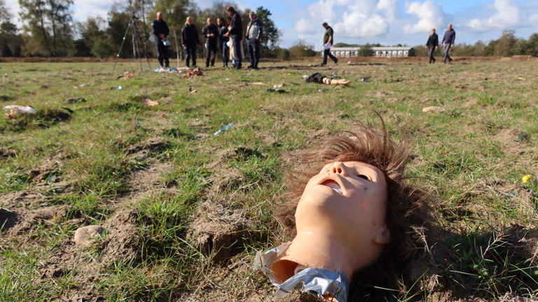 The head of a mannequin loose on the ground after the mannequin has been inflated